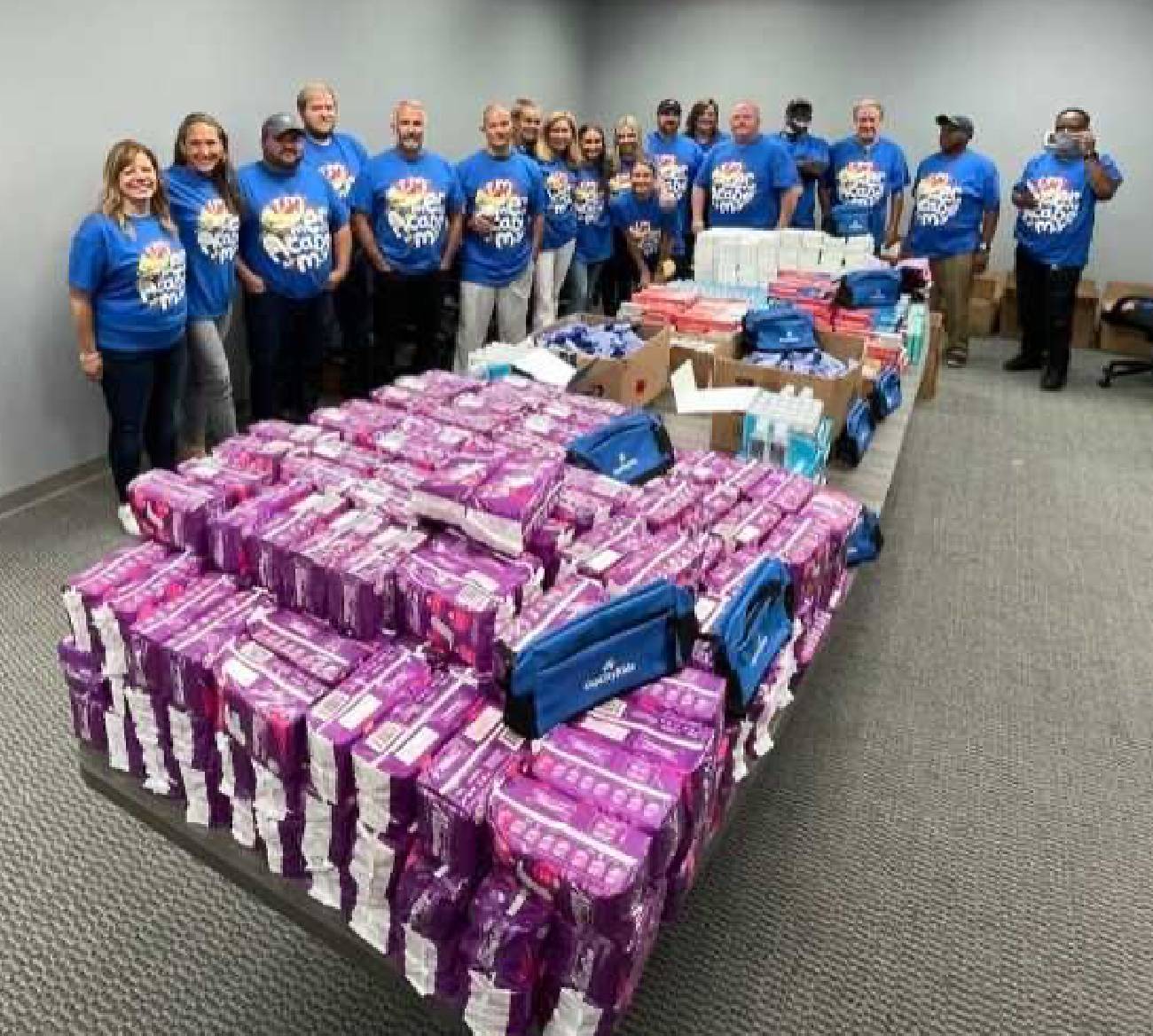 Volunteers donating bookbags