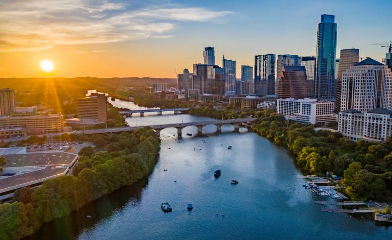 Lady Bird Lake and Austin skyline at sunset