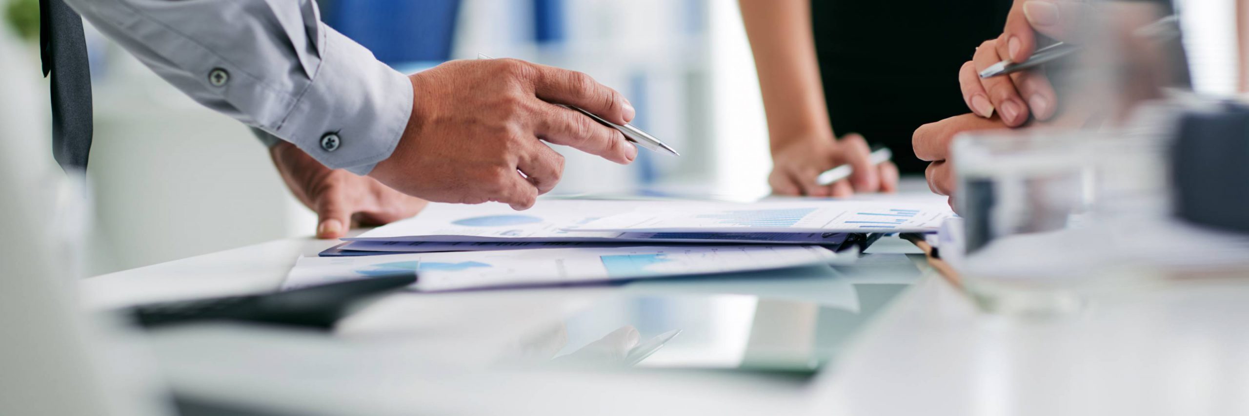 People reviewing documents