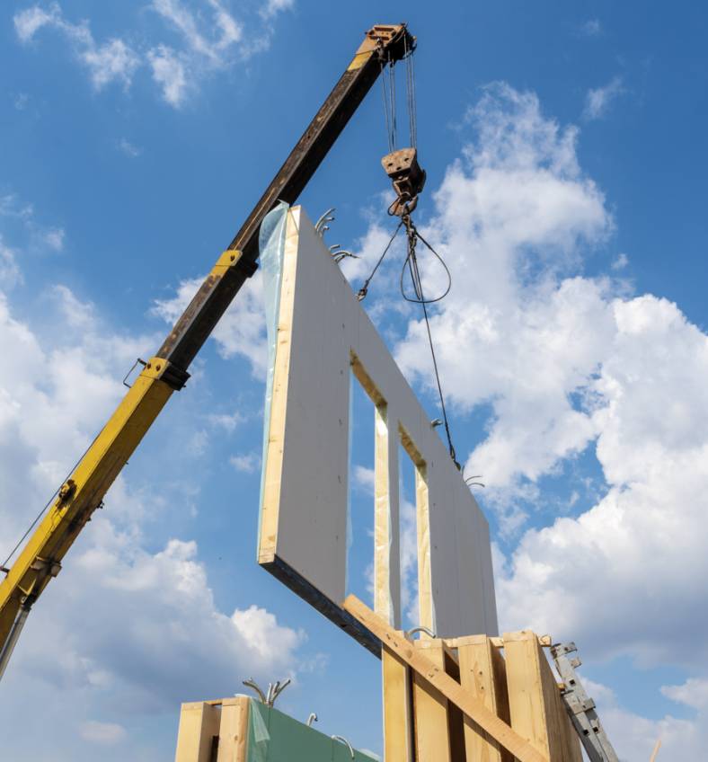 Crane lifting prefabricated wall