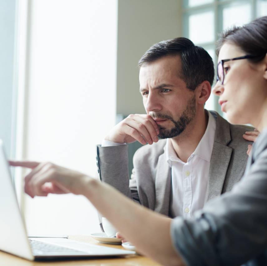 Two Amherst team members analyzing data